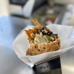 Falafel Vegas - Pita sandwich called 'Sabich'. It have hard void egg, eggplant, French fries and all the salads as option.