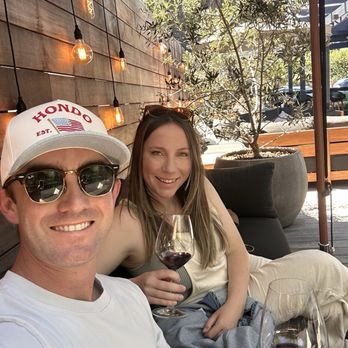 Terre Et Sang - Hanging on their patio, always fun! - Wine Tasting Room Near Me - Los Olivos, California