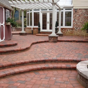 Life Time Pavers - a patio with a pergol roof - Landscaping Near Me Life Time Pavers - a patio with a pergol roof - Landscaping Near Me