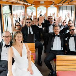 Interior seating on a vintage trolley for comfortable wedding transportation in Asheville