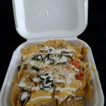 Tacos El Tapatio - Chicken Nachos. Cheap store bought chips, but huge amounts of food and meat for a low low price which completely makes up for it - Mexican Near Me - Chico, California Tacos El Tapatio - Chicken Nachos. Cheap store bought chips, but huge amounts of food and meat for a low low price which completely makes up for it - Mexican Near Me - Chico, California