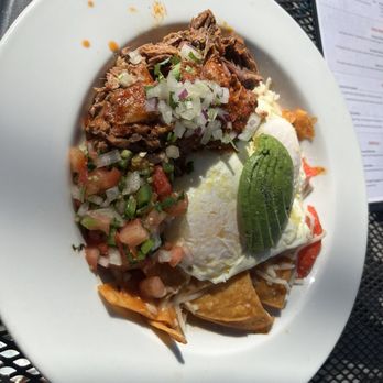 Evarista’s Comal Restaurant - Chilaquiles with Birria in red sauce - New American Near Me - Capitola, California Evarista’s Comal Restaurant - Chilaquiles with Birria in red sauce - New American Near Me - Capitola, California