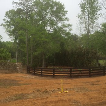 Brasher’s Fencing and Deck - 4-rail ranch style fence - stained black - Decks & Railing Near Me - Millbrook, Alabama