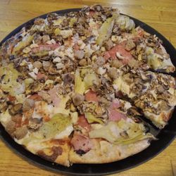 Nick's Pizza - Excellent build-your-own meat and vegetables pizza. Crust is crispy throughout.