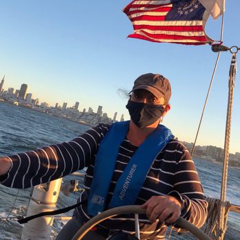 Creative Concierge SF - Captain Zorah at the helm - Boating Near Me Creative Concierge SF - Captain Zorah at the helm - Boating Near Me