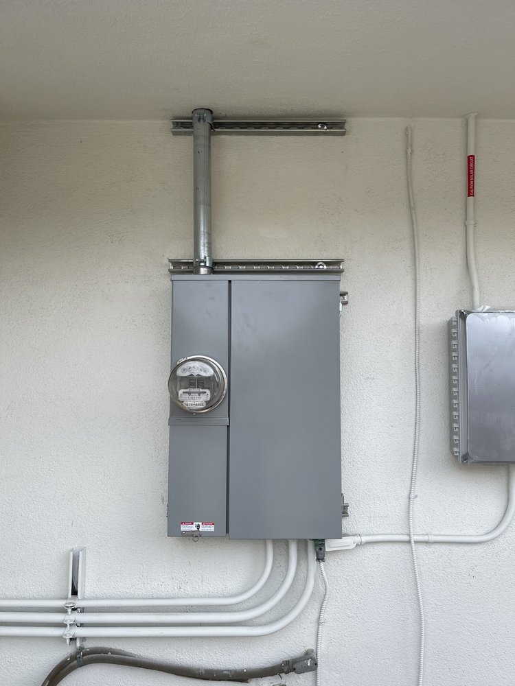 Slide of QM Electrical Services