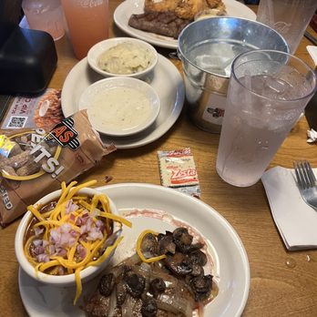 Texas Roadhouse - 6oz Sirloin smothered in mushrooms and onion, chili with cheese and onions. - Steakhouses Near Me - Gilbert, Arizona Texas Roadhouse - 6oz Sirloin smothered in mushrooms and onion, chili with cheese and onions. - Steakhouses Near Me - Gilbert, Arizona