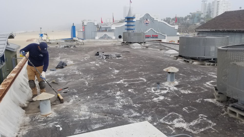 Slide of Maverick Roofing