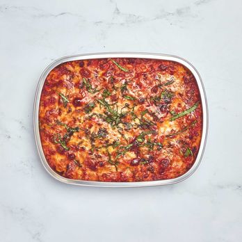 Orders UP - Baked Ziti: Ziti pasta, house made beef and sausage marinara sauce, & yummy melty cheeses. - Food Delivery Services Near Me - Bozeman, Montana
