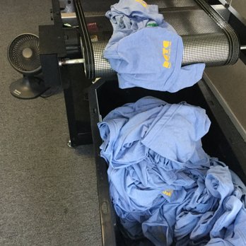 Aptos Screen Printing - Marathon/Half Marathon shirts coming out of the dryer - Screen Printing Near Me - Santa Cruz, California