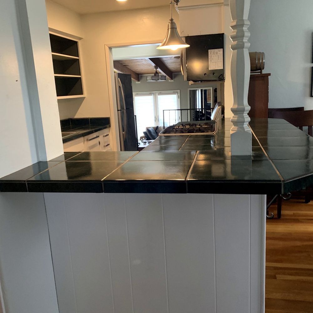 Infinity Design and Build - Before -- Bar-height counter, random Victorian post/column - General Contractors Near Me - San Diego, California Infinity Design and Build - Before -- Bar-height counter, random Victorian post/column - General Contractors Near Me - San Diego, California