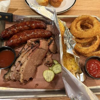 Jim 'N Nick's Bar-B-Q - Mr. Jim's combo plate with 2 meats (Jalapeño Cheddar Sausage and Brisket) with Bar-B-Q Corn on the Cob and Onion Rings - Barbeque Near Me - Knoxville, Tennessee