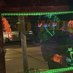 Alley Cat Bar & Grill - Broken window