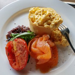 Scrambled eggs w pastry and salmon.