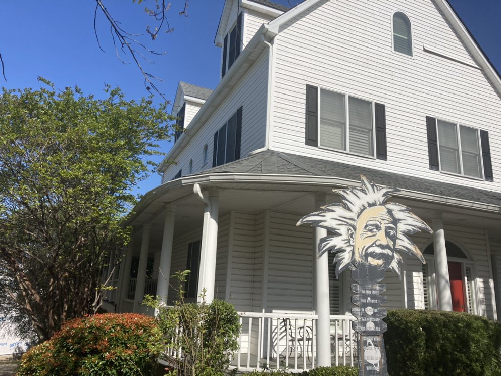 Slide of Gutter Guys Construction