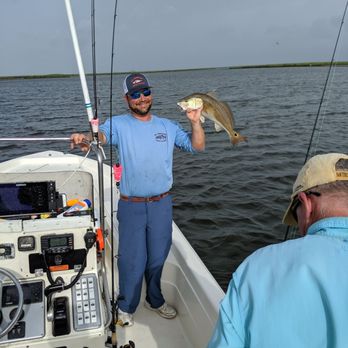 St Bernard Fishing Charters - Capt Ed holds up a nice redfish - Boat Charters Near Me - Saint Bernard, Louisiana St Bernard Fishing Charters - Capt Ed holds up a nice redfish - Boat Charters Near Me - Saint Bernard, Louisiana