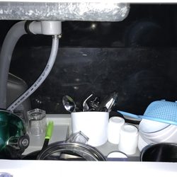 JUCY Rentals - Queenstown Airport - June 2018 - our Jucy camper van! Each Jucy comes with pots, pans, utensils, and a fully functioning kitchen sink!