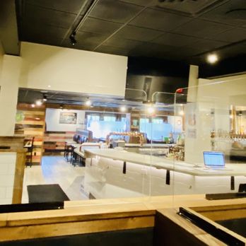The Fix Burger Bar - Dining area with plexiglass separators - Burgers Near Me - Marlborough, Massachusetts The Fix Burger Bar - Dining area with plexiglass separators - Burgers Near Me - Marlborough, Massachusetts