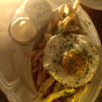 Au Cheval - Crispy Fries , Garlic Aioli & Fried Farm Egg - delicious! - Bars Near Me - Chicago, Illinois