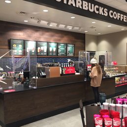 Starbucks counter in the store with extremely nice male barista. The woman was friendly too.