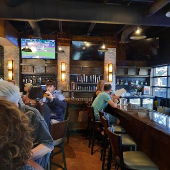 Maple Street Tavern - people sitting at the bar - Sports Bars Near Me - Wyandotte, Michigan