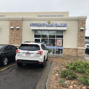 Nothing Bundt Cakes - two cars parked in front of a business - Desserts Near Me - Lone Tree, Colorado