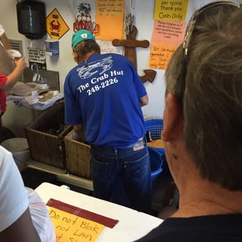 The Crab Hut - a group of people in a kitchen - Seafood Markets Near Me - Tampa, Florida The Crab Hut - a group of people in a kitchen - Seafood Markets Near Me - Tampa, Florida