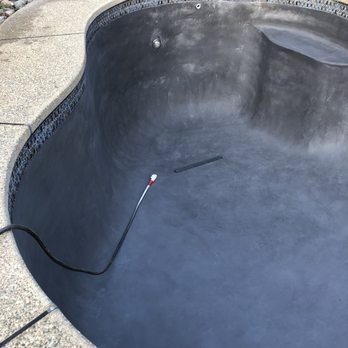 Water splash pool plastering - New drain and pool light, just before re-filling. - Pool & Hot Tub Service Near Me - Lodi, California