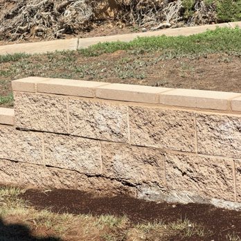 Bill's Landscaping - Footing after carving extra concrete that spilled over into yard. - Landscaping Near Me - Lancaster, California
