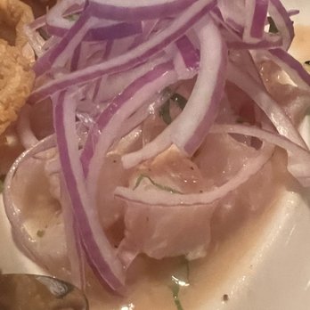 Incas Grill Peruvian kitchen - Ceviche made with marinated fluke in lemon and herbs with onions. So fresh - Peruvian Near Me - Staten Island, New York Incas Grill Peruvian kitchen - Ceviche made with marinated fluke in lemon and herbs with onions. So fresh - Peruvian Near Me - Staten Island, New York