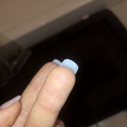 Princess Nails - The corner chipped off after she filed down the large bump.
