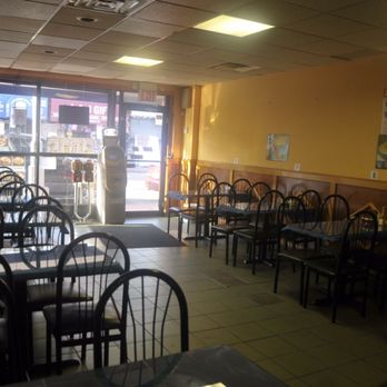El Encanto Centro Americano Restaurant - empty tables and chairs - Salvadoran Near Me - Jamaica, New York El Encanto Centro Americano Restaurant - empty tables and chairs - Salvadoran Near Me - Jamaica, New York