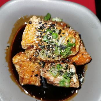 Biirū - a white bowl of food on a red table - Japanese Near Me - Montreal, Quebec