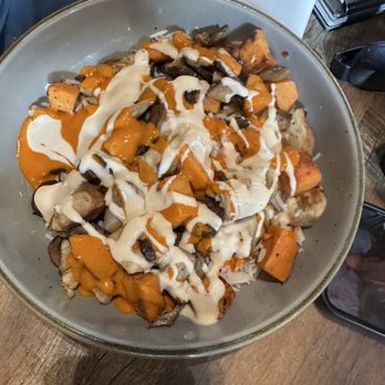 LIZ - Rice bowl with cashew and peri peri sauce - Acai Bowls Near Me - Telluride, Colorado