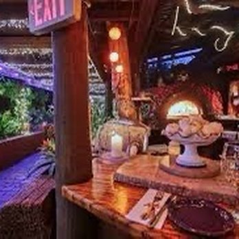 The Garlic - When Waiting for Seating, Enjoy the Beautiful decor - Italian Near Me - New Smyrna Beach, Florida The Garlic - When Waiting for Seating, Enjoy the Beautiful decor - Italian Near Me - New Smyrna Beach, Florida