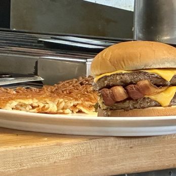 Waffle House - Bacon double cheeseburger with hash browns. - Breakfast & Brunch Near Me - Melbourne, Florida