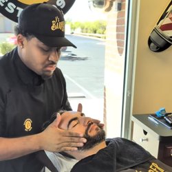 V's Barbershop - Silverado - Beard Trim Deluxe includes beard cleanup, a hot towel, a relaxing facial treatment, and detailed shaping using a straight-edge razor.