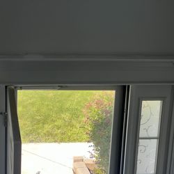 RE/MAX All American Realty - Above the front door