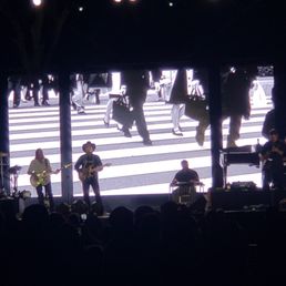 a band performing on stage