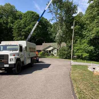 Goose's Tree Service - a truck with a crane - Tree Services Near Me - Joelton, Tennessee