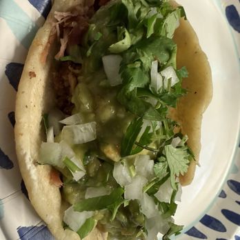 Los Cinco Puntos - My carnitas taco after I dressed Jt - Mexican Near Me - Los Angeles, California Los Cinco Puntos - My carnitas taco after I dressed Jt - Mexican Near Me - Los Angeles, California