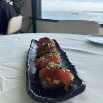 The Harbor Restaurant - This is one of their appetizers fresh ahi on a unique rice patty. Along with a beautiful view at my table. - Seafood Near Me - Santa Barbara, California The Harbor Restaurant - This is one of their appetizers fresh ahi on a unique rice patty. Along with a beautiful view at my table. - Seafood Near Me - Santa Barbara, California