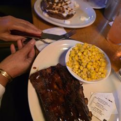 1/2 rack ribs and 2 sides $18