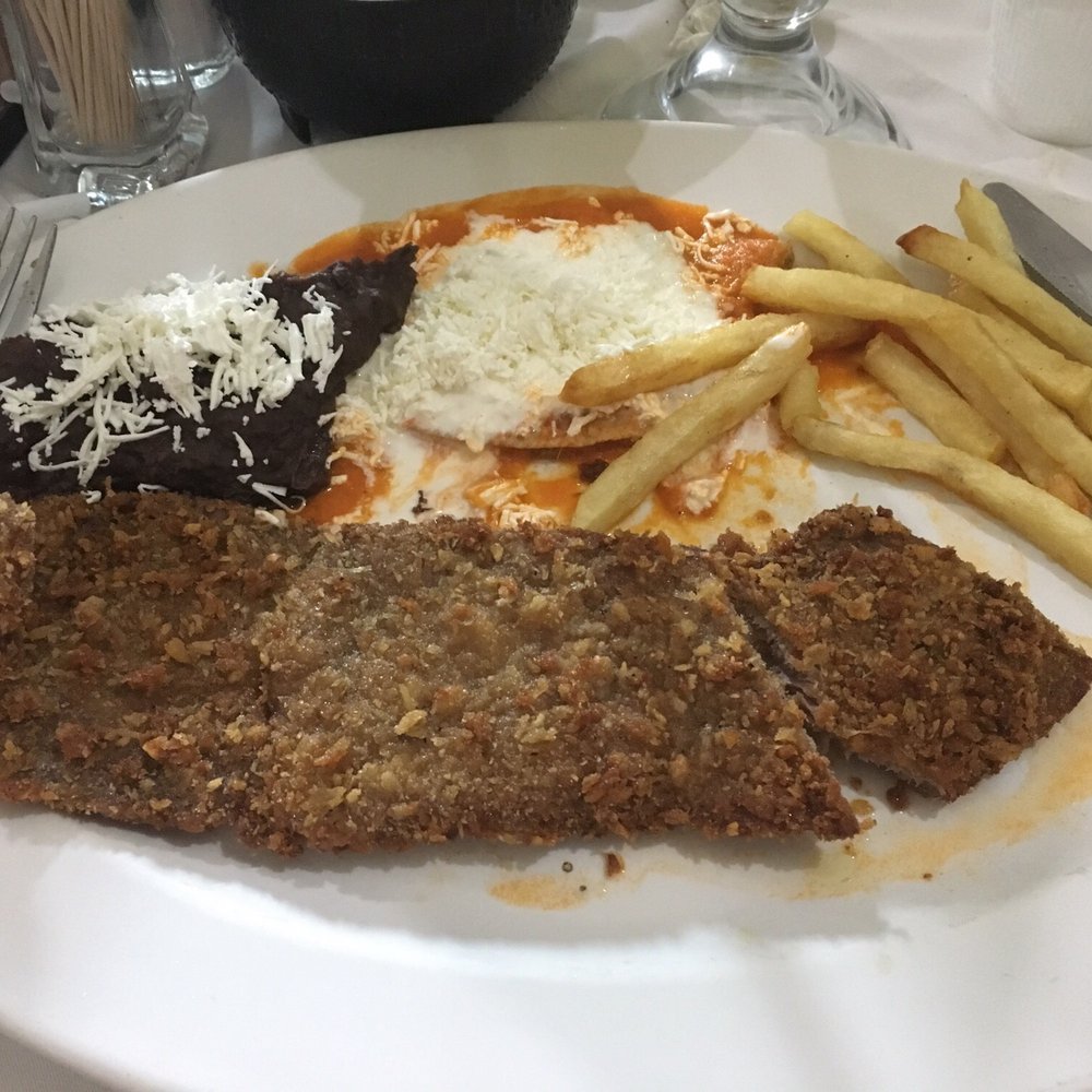 Fonda El Morral - Milanesa was decent but the rest (beans, enchilada, fries) had no flavor. And this plate cost over 200 pesos. - Mexican Near Me - México, D.F., DIF Fonda El Morral - Milanesa was decent but the rest (beans, enchilada, fries) had no flavor. And this plate cost over 200 pesos. - Mexican Near Me - México, D.F., DIF