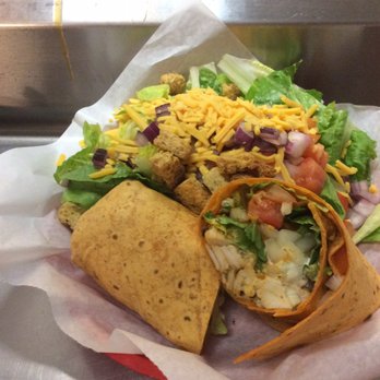 Marty's Sports Bar - a taco salad in a basket - Sports Bars Near Me - Springfield, Missouri Marty's Sports Bar - a taco salad in a basket - Sports Bars Near Me - Springfield, Missouri