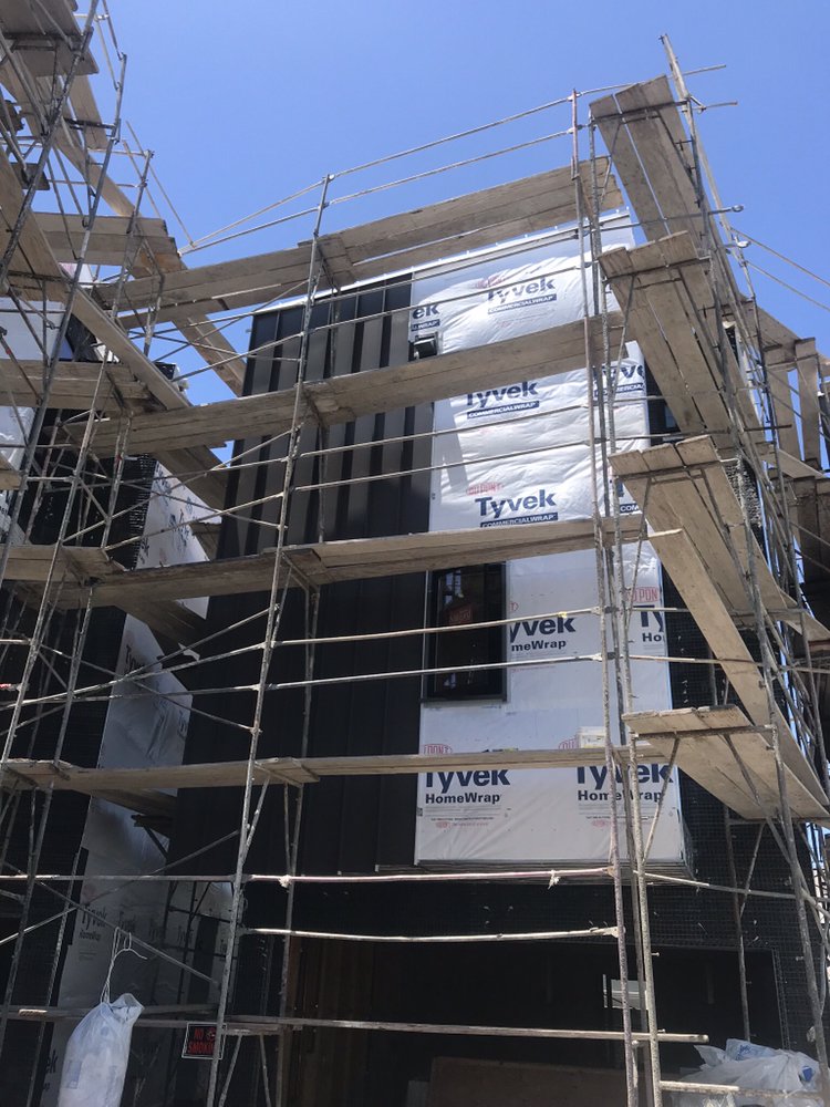 Slide of MA Roofing and Gutters