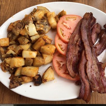 Sunset Grill - Three eggs (substituted for tomatoes) bacon and home fries ($9.49) - Breakfast & Brunch Near Me - Oakville, Ontario Sunset Grill - Three eggs (substituted for tomatoes) bacon and home fries ($9.49) - Breakfast & Brunch Near Me - Oakville, Ontario