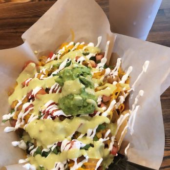 Top Shelf Tacos - Loaded fries loaded with green fire salsa! So good!!! - Mexican Near Me - Carson, California