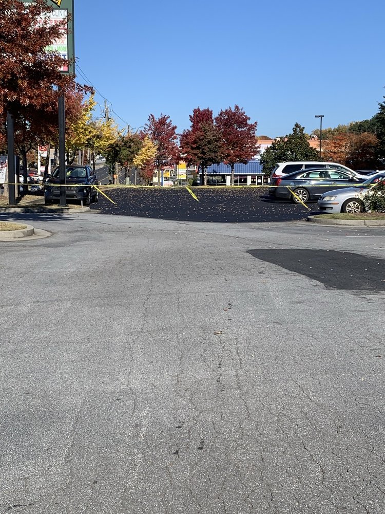 Slide of A1 Seal Coating and Roofing