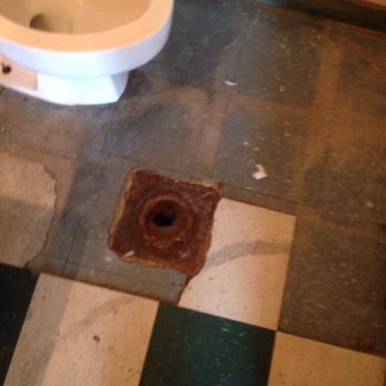 Kwik Wash Laundry - Hole in bathroom floor - Laundromat Near Me - San Antonio, Texas